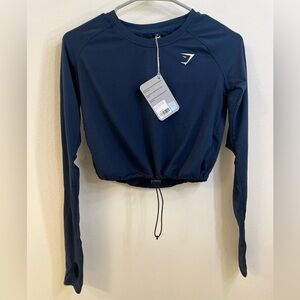 NWT. Size XS. Gymshark drawcord crop. Blue